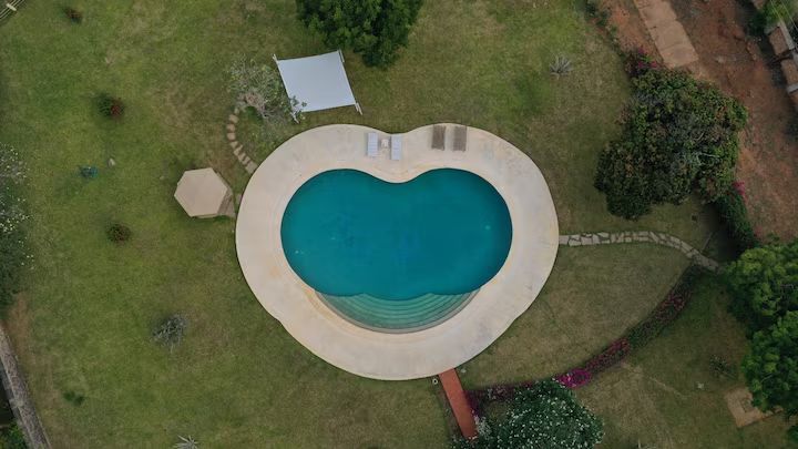 Aerial view of Le Pleiadi's distinctive swimming pool
